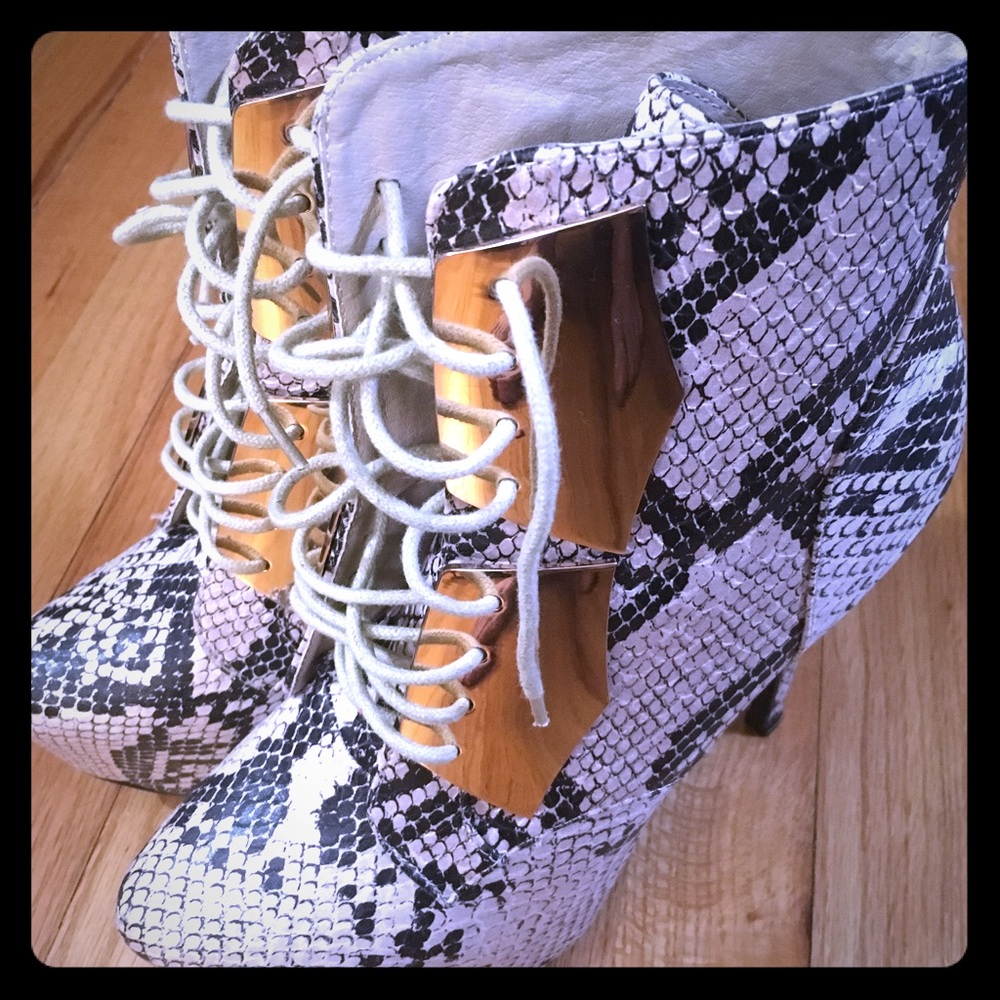 Steve Madden snake skin high heel boots